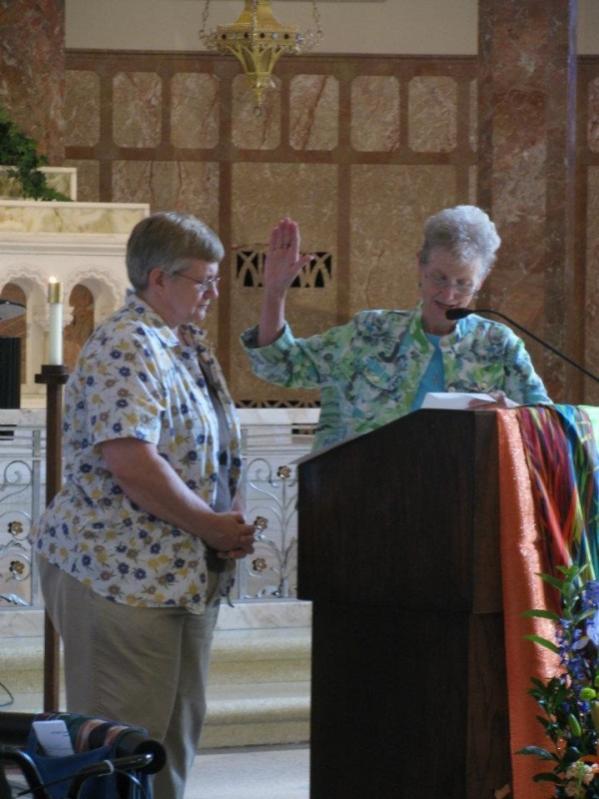 IHM Candidate Diane Brown receives a blessing from Sister Mary Bea Keeley, IHM