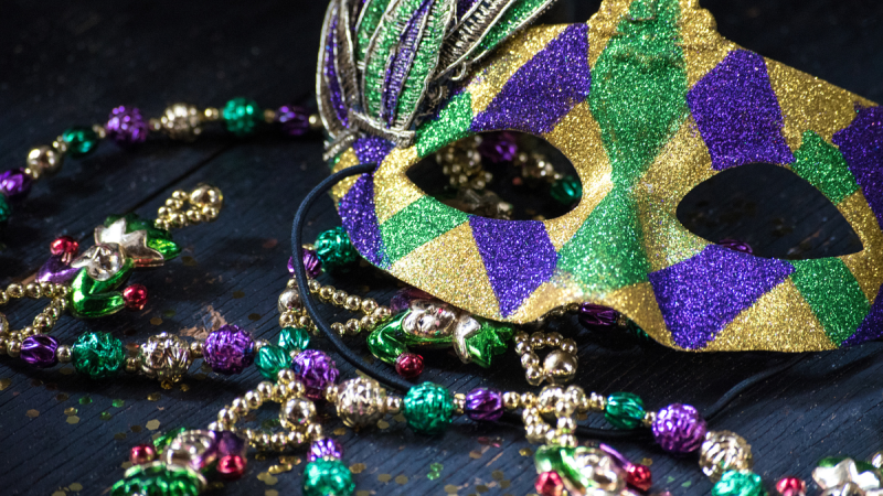 Mardi Gras beads and mask