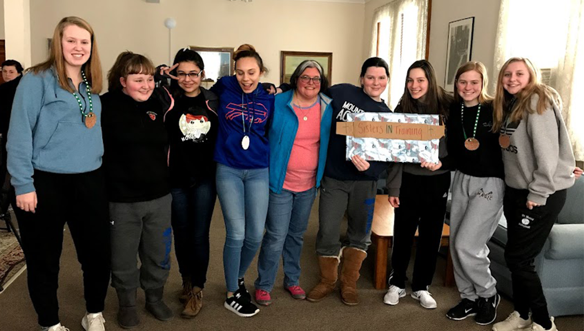 Sister Jenny Wilson, RSM, with students on retreat. 