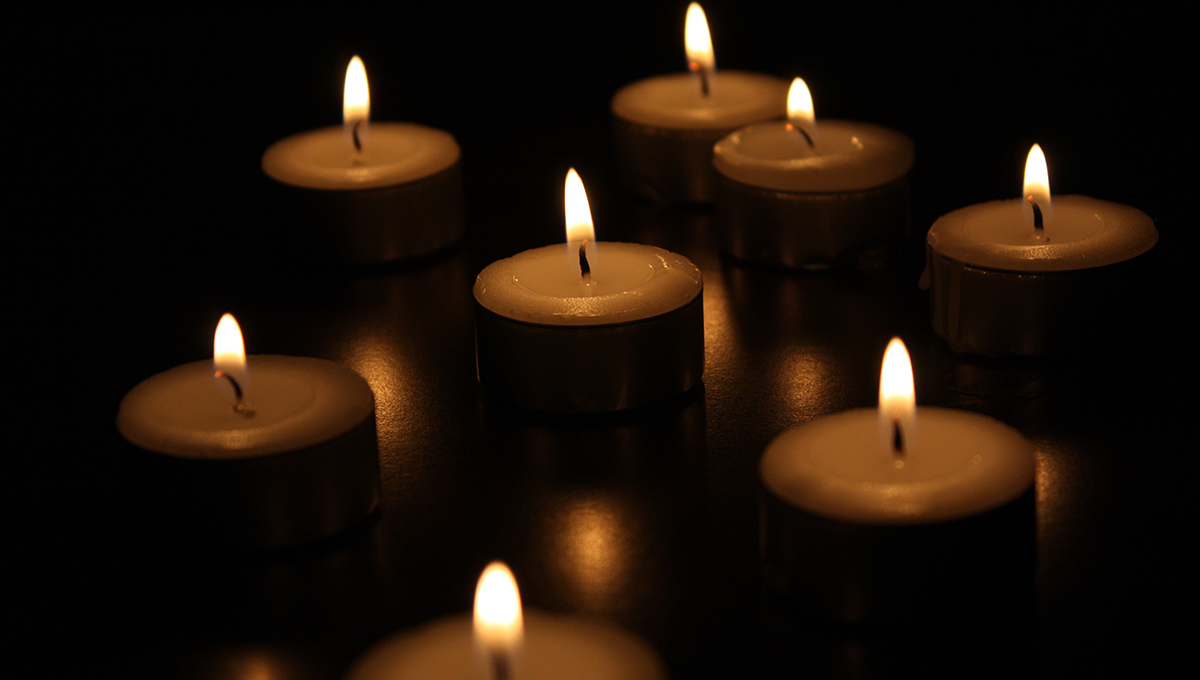 candles burning inside a church