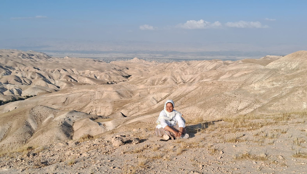Sister Cecilia Sierra praying in the Judean desert near Mount Musa 