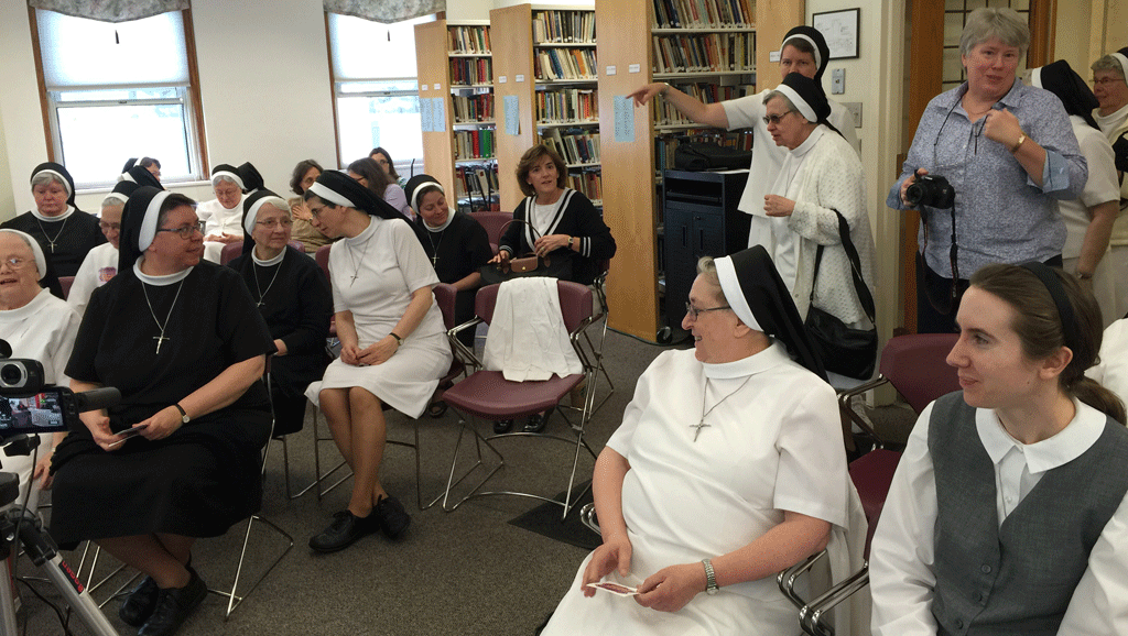 Audience gathering for the podcast.