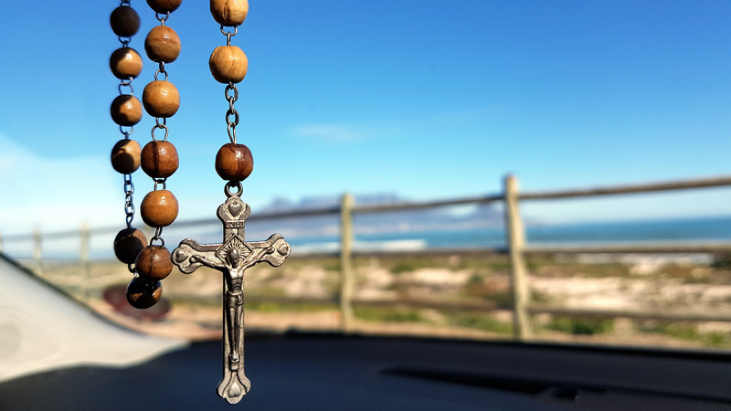 praying the rosary outdoors