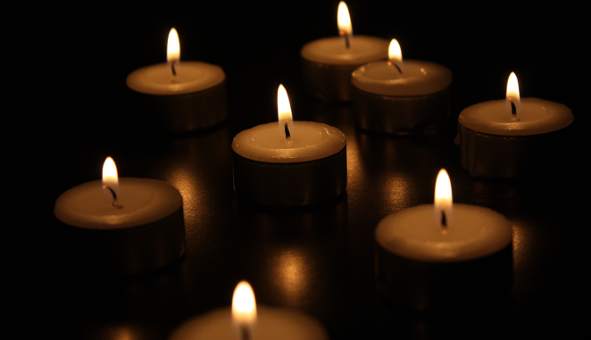 candles burning inside a church